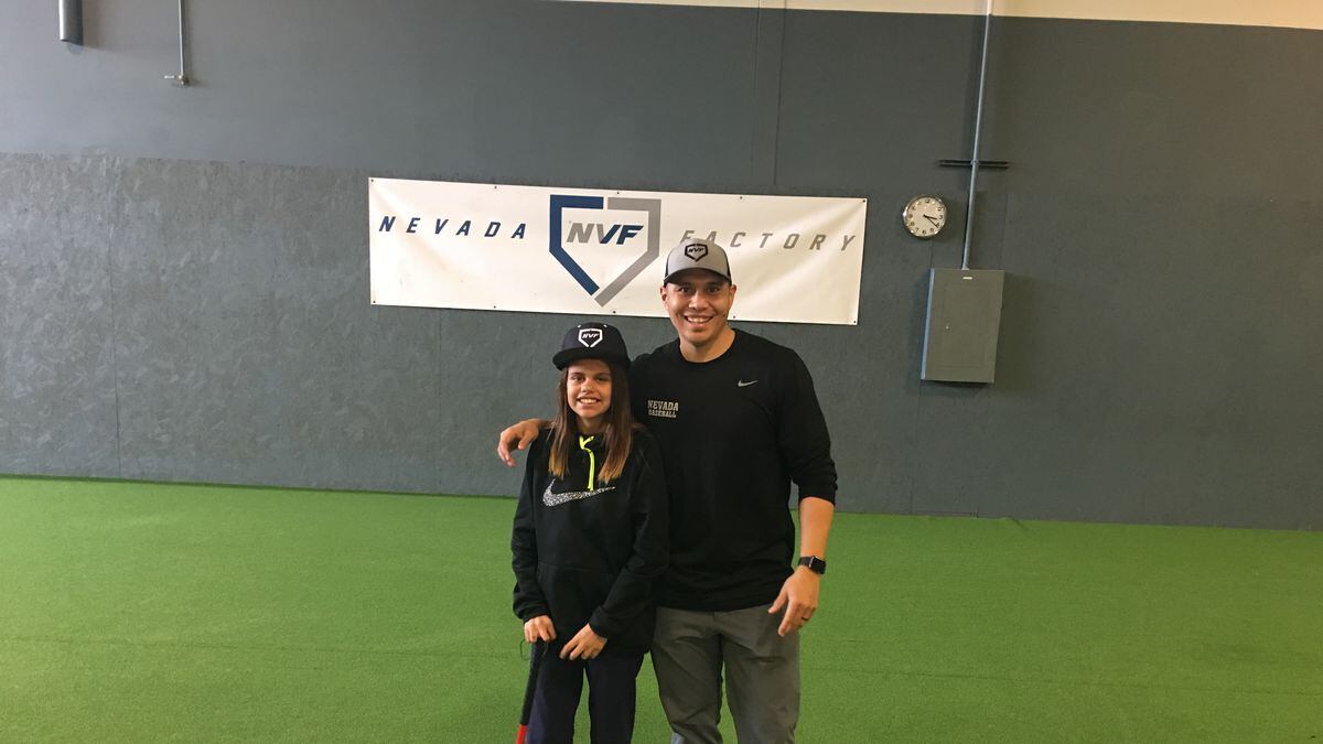 12-year-old Christina is looking for a family to adopt her. Former MLB outfielder Chris Aguila helped teach her some baseball skills at his Reno, Nev. business Nevada Baseball Factory.
