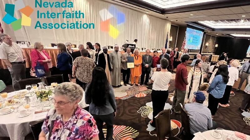 Interfaith leaders from the Reno, Nevada area pose for pictures after the 2022 Nevada Prayer...