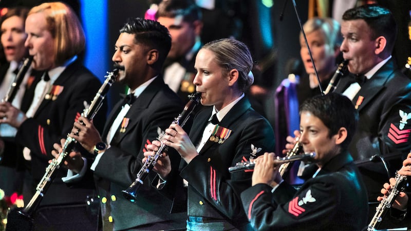 Members of the United States Navy Band perform during the band's annual Holiday Concert in...