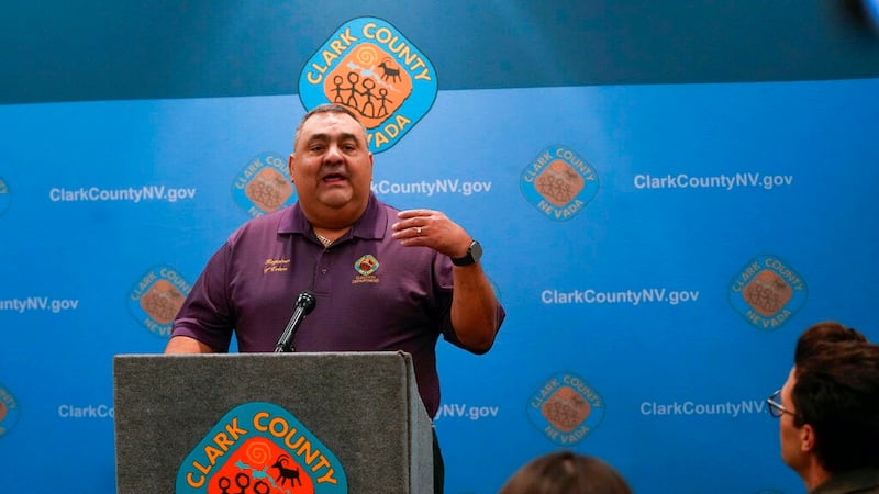 Clark County Registrar of Voters Joe Gloria, right, speaks at a news conference at the Clark...