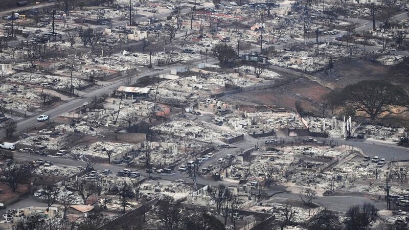 Wildfire wreckage is shown Thursday, Aug. 10, 2023, in Lahaina, Hawaii. (AP Photo/Rick Bowmer)