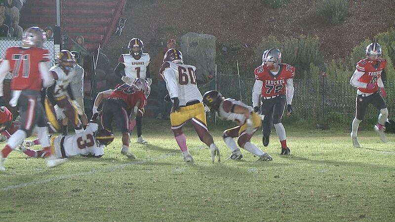 Truckee's Joe Birnbaum runs through seven Sparks defenders on his way for a touchdown