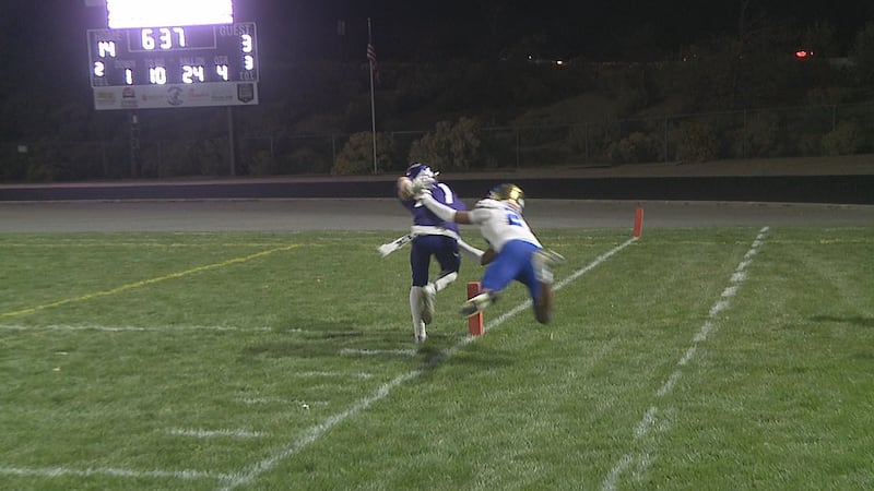 Spanish Springs wide receiver Brady Hummel just gets inside the pylon for a touchdown as...