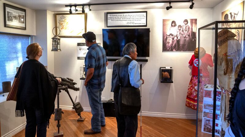 Western Mining Action Network attendees visit the "Wounded Souls: Extracting from the Land and...
