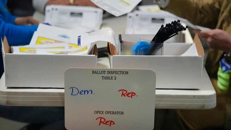 Election workers process ballots at the Clark County Election Department, Thursday, Nov. 10,...
