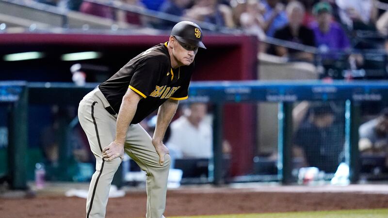 San Diego Padres third base coach Matt Williams pauses on the field during the seventh inning...