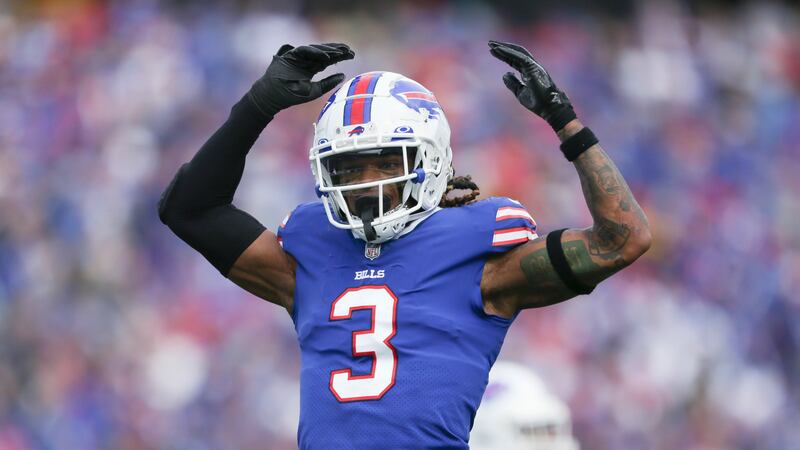 FILE - Buffalo Bills safety Damar Hamlin reacts after a play during the first half of the...