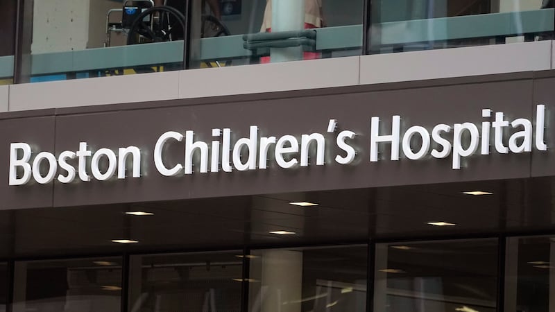 FILE - A sign hangs on Boston Children's Hospital, Thursday, Aug. 18, 2022, in Boston. A...