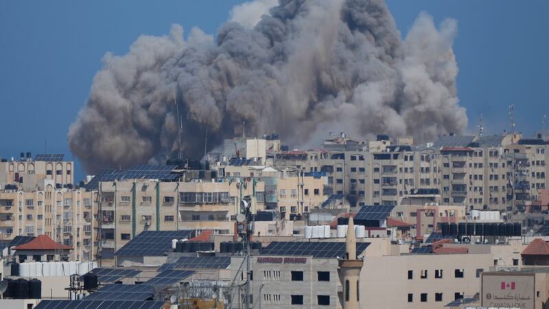 Smoke rises following an Israeli airstrike in Gaza City, Thursday, Oct. 12, 2023.(AP...