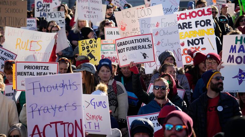 Students and parents from schools across Colorado take part in a rally calling for state...