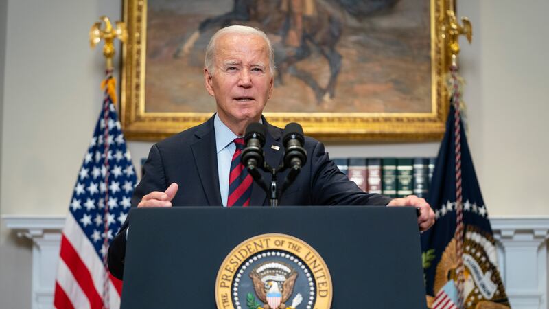 FILE - President Joe Biden talks with reporters after delivering remarks on student loan debt...
