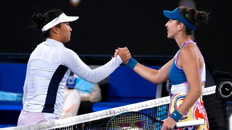 Belinda Bencic, right, of Switzerland is congratulated by Claire Liu of the U.S. following...